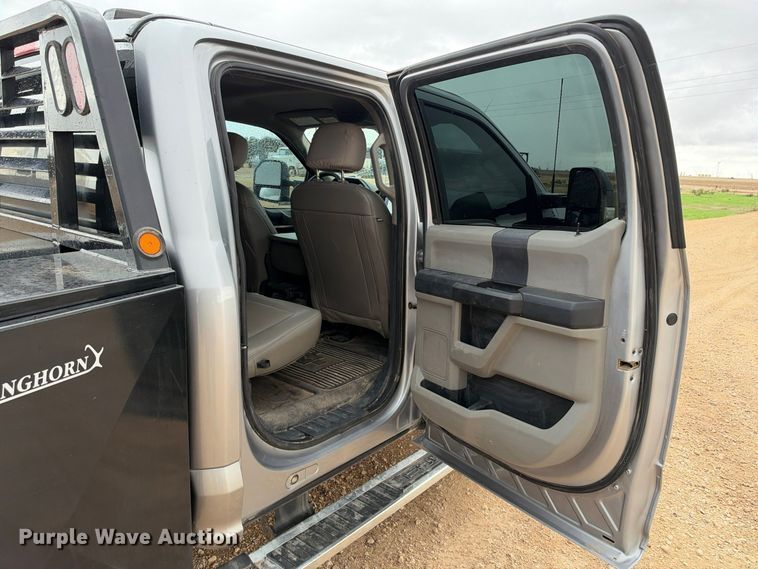 image for item FC0494 2022 Ford F350 Super Duty Crew Cab dump flatbed pickup truck