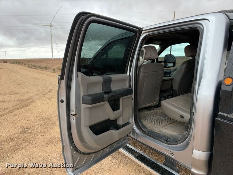 image for item FC0494 2022 Ford F350 Super Duty Crew Cab dump flatbed pickup truck