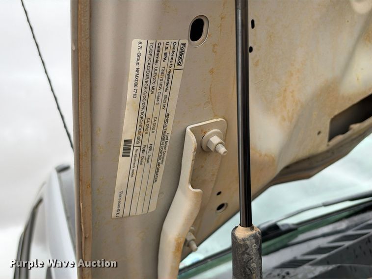 image for item FC0494 2022 Ford F350 Super Duty Crew Cab dump flatbed pickup truck
