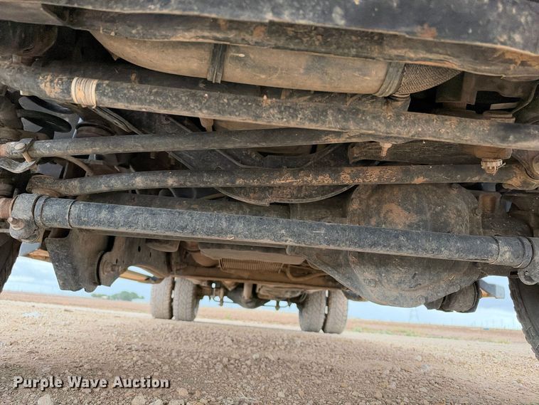 image for item FC0494 2022 Ford F350 Super Duty Crew Cab dump flatbed pickup truck