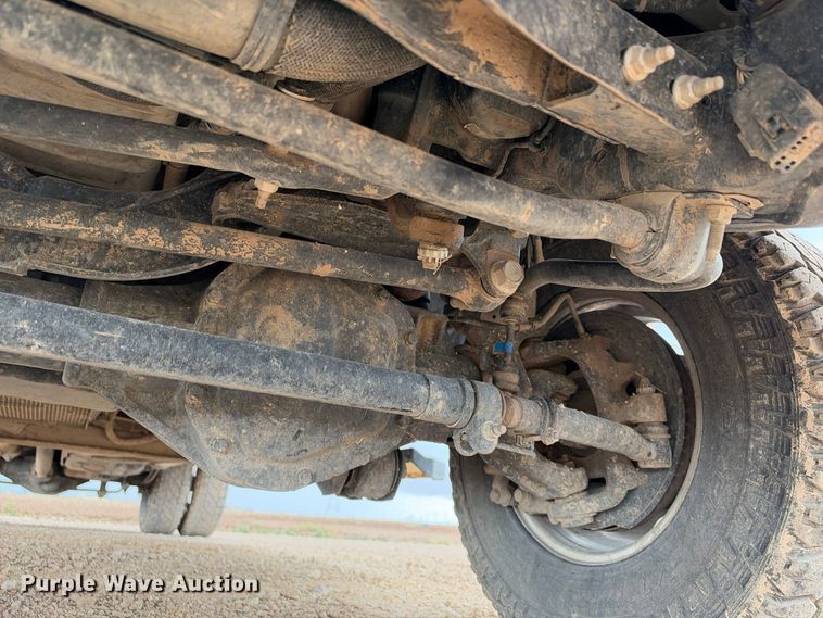image for item FC0494 2022 Ford F350 Super Duty Crew Cab dump flatbed pickup truck