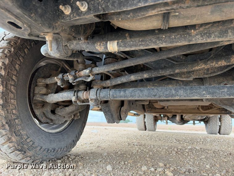 image for item FC0494 2022 Ford F350 Super Duty Crew Cab dump flatbed pickup truck