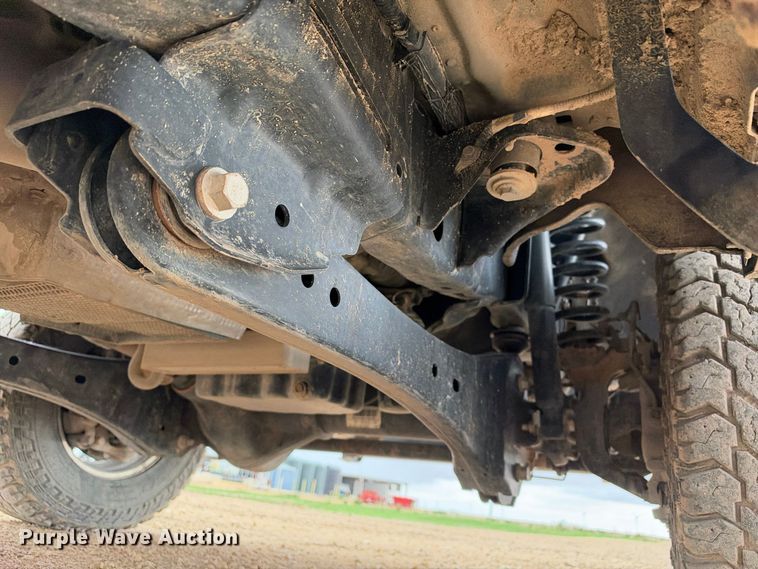 image for item FC0494 2022 Ford F350 Super Duty Crew Cab dump flatbed pickup truck
