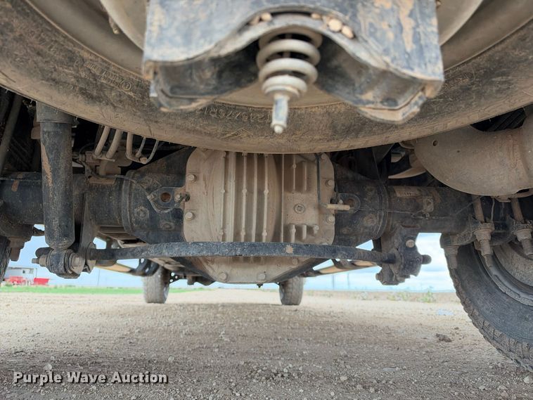 image for item FC0494 2022 Ford F350 Super Duty Crew Cab dump flatbed pickup truck