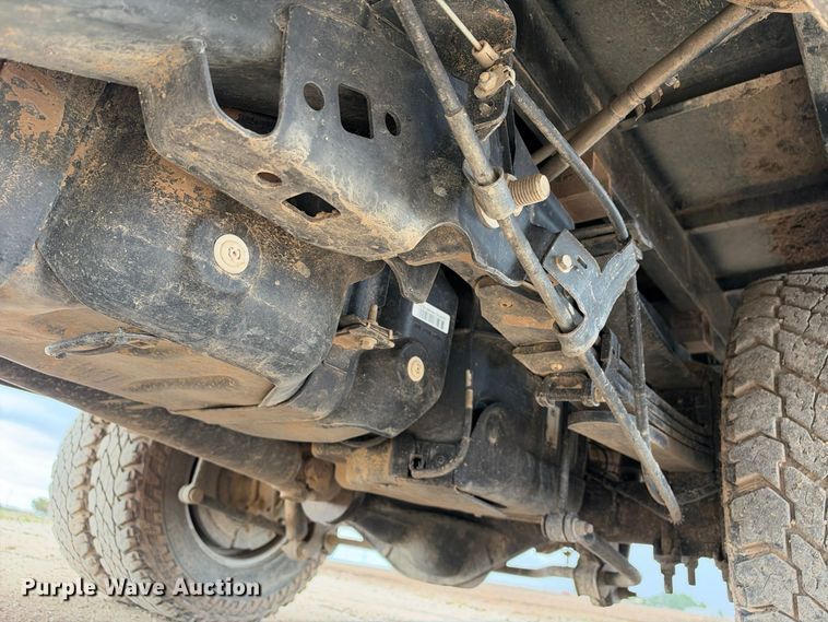 image for item FC0494 2022 Ford F350 Super Duty Crew Cab dump flatbed pickup truck