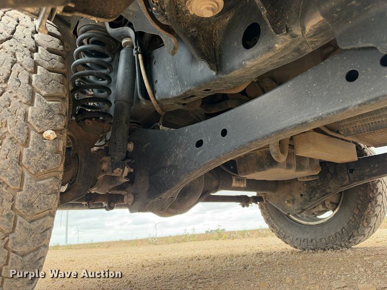 image for item FC0494 2022 Ford F350 Super Duty Crew Cab dump flatbed pickup truck