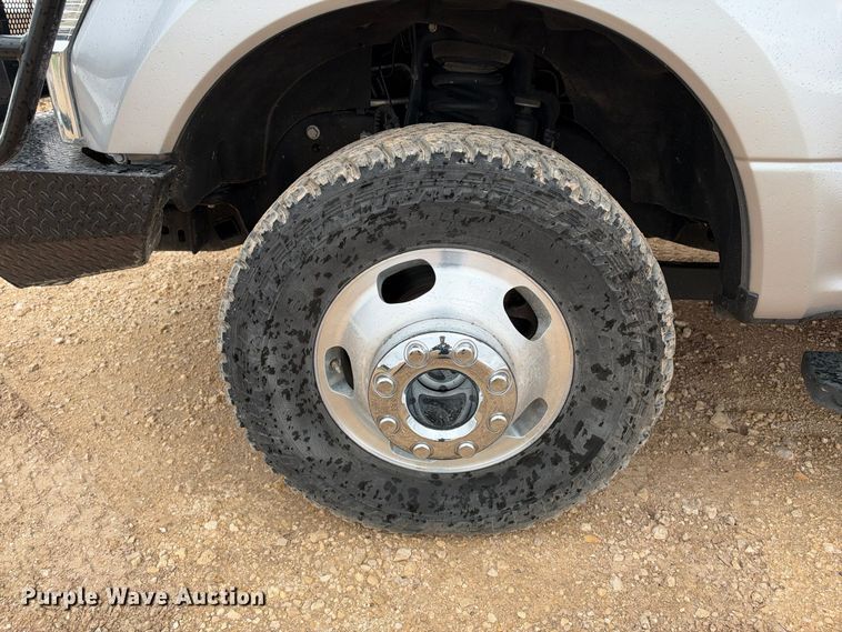 image for item FC0494 2022 Ford F350 Super Duty Crew Cab dump flatbed pickup truck