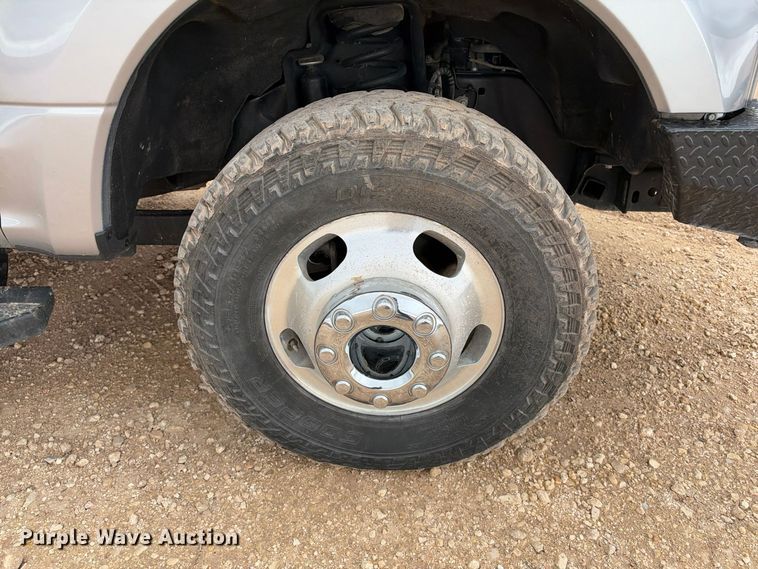 image for item FC0494 2022 Ford F350 Super Duty Crew Cab dump flatbed pickup truck