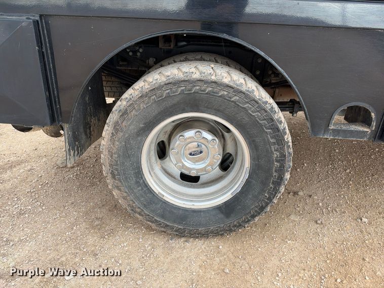 image for item FC0494 2022 Ford F350 Super Duty Crew Cab dump flatbed pickup truck