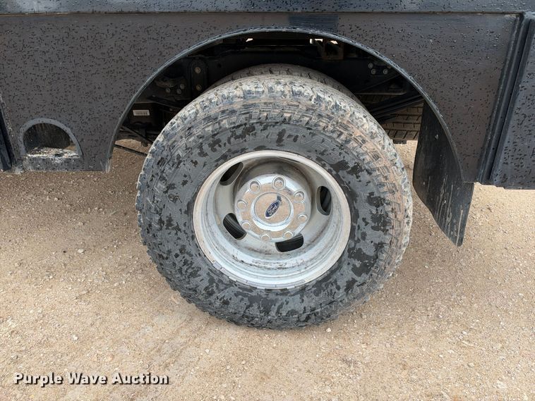 image for item FC0494 2022 Ford F350 Super Duty Crew Cab dump flatbed pickup truck