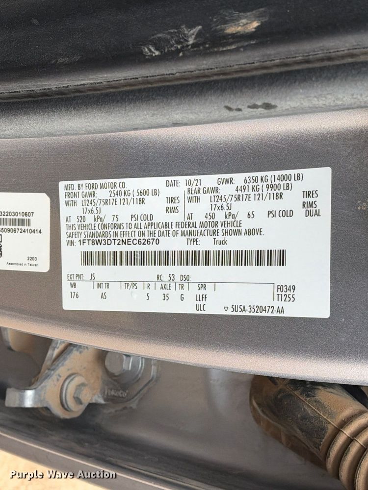 image for item FC0494 2022 Ford F350 Super Duty Crew Cab dump flatbed pickup truck