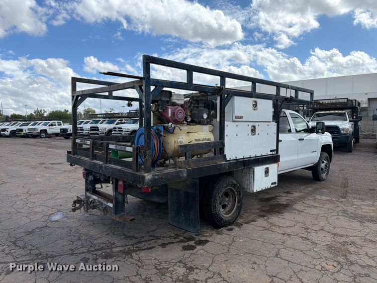 image for item FI2084 2016 Chevrolet Silverado 3500HD Crew Cab flatbed pickup truck