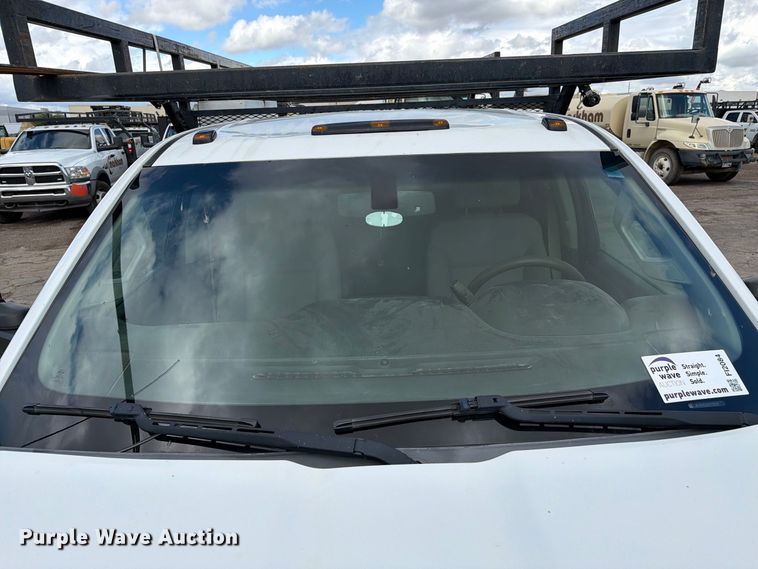 image for item FI2084 2016 Chevrolet Silverado 3500HD Crew Cab flatbed pickup truck