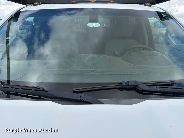image for item FI2084 2016 Chevrolet Silverado 3500HD Crew Cab flatbed pickup truck