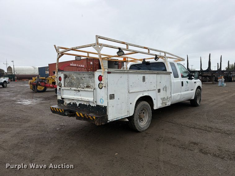 image for item EP3076 2003 Ford F250 Super Duty Ext. Cab utility bed pickup truck