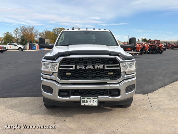 image for item EW1194 2020 RAM 3500 Crew Cab flatbed pickup truck