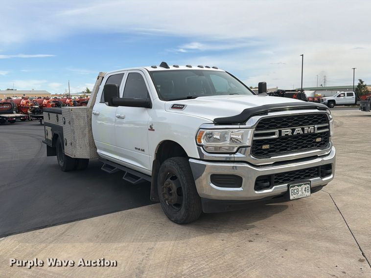 image for item EW1194 2020 RAM 3500 Crew Cab flatbed pickup truck
