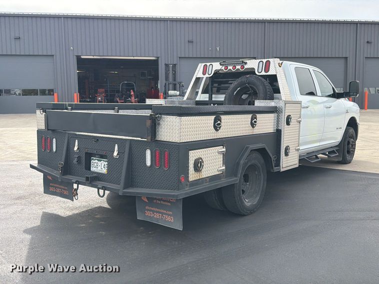 image for item EW1194 2020 RAM 3500 Crew Cab flatbed pickup truck