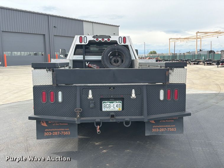image for item EW1194 2020 RAM 3500 Crew Cab flatbed pickup truck