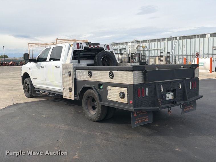 image for item EW1194 2020 RAM 3500 Crew Cab flatbed pickup truck