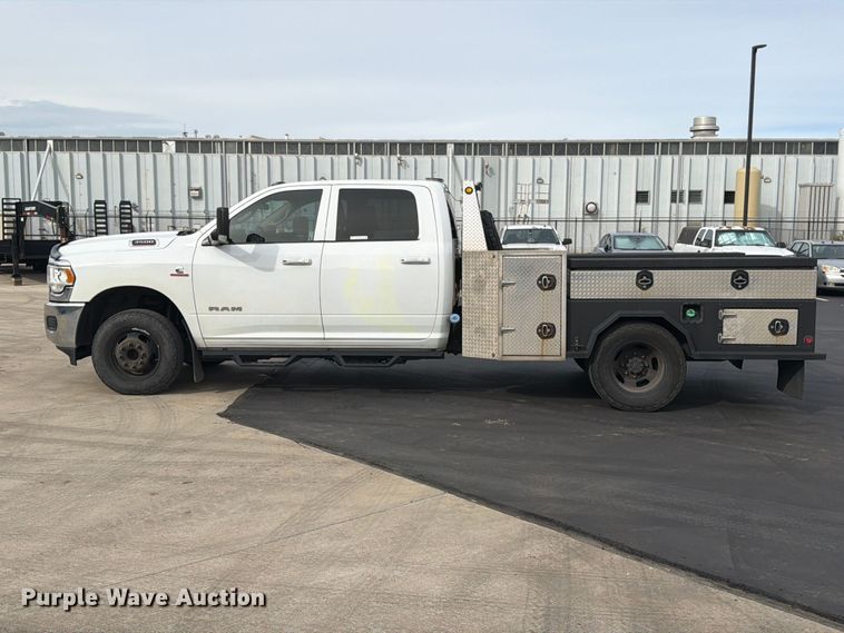 image for item EW1194 2020 RAM 3500 Crew Cab flatbed pickup truck