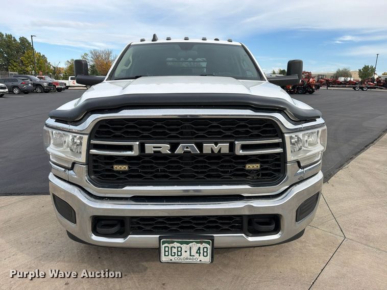 image for item EW1194 2020 RAM 3500 Crew Cab flatbed pickup truck