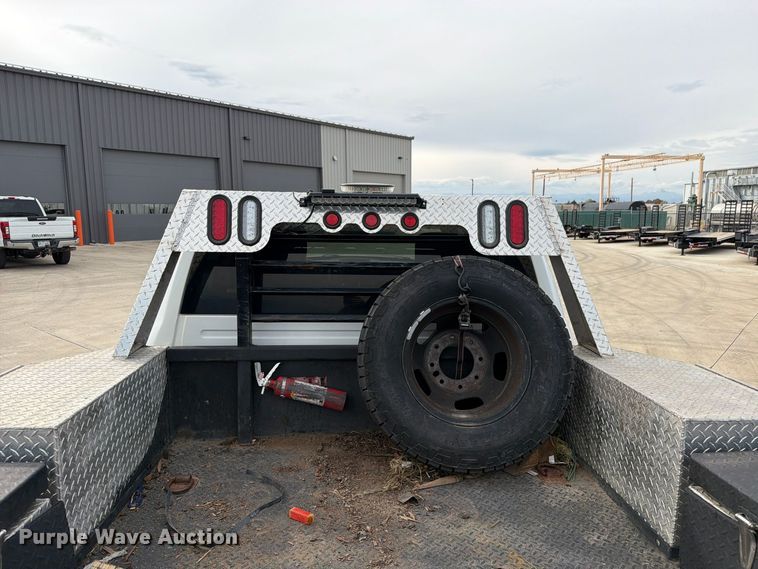image for item EW1194 2020 RAM 3500 Crew Cab flatbed pickup truck