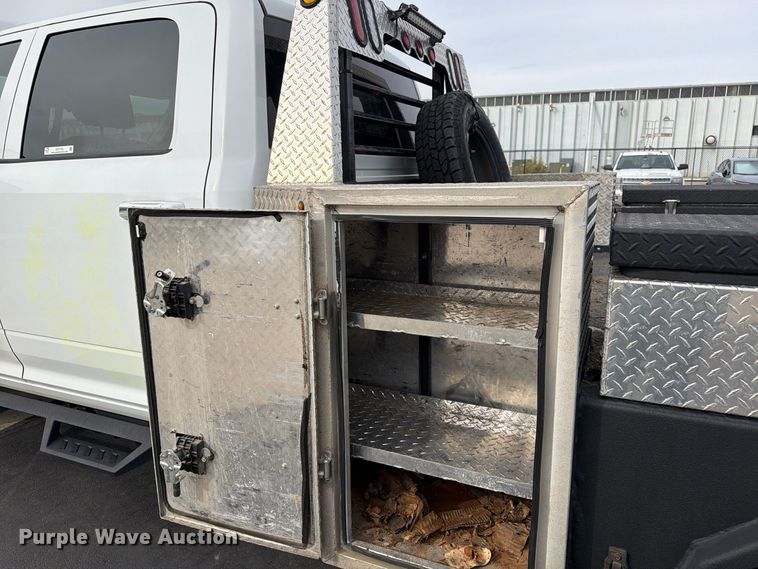 image for item EW1194 2020 RAM 3500 Crew Cab flatbed pickup truck