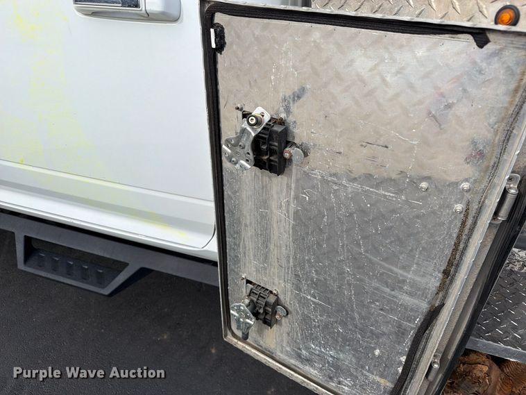 image for item EW1194 2020 RAM 3500 Crew Cab flatbed pickup truck