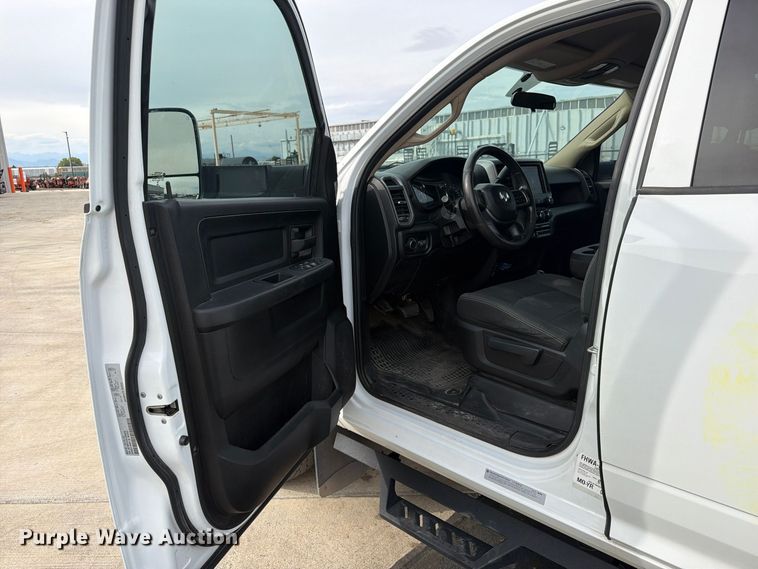 image for item EW1194 2020 RAM 3500 Crew Cab flatbed pickup truck