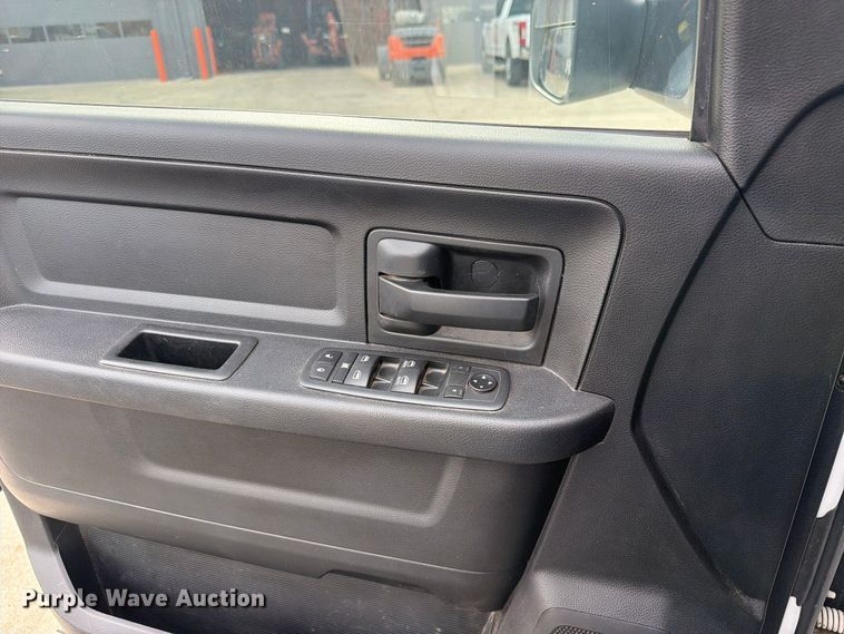 image for item EW1194 2020 RAM 3500 Crew Cab flatbed pickup truck