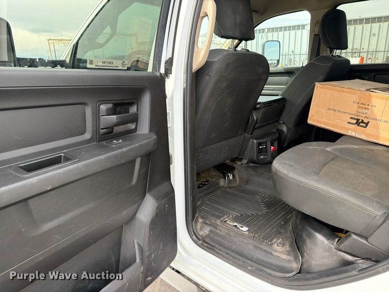 image for item EW1194 2020 RAM 3500 Crew Cab flatbed pickup truck