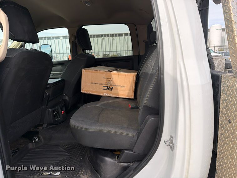 image for item EW1194 2020 RAM 3500 Crew Cab flatbed pickup truck
