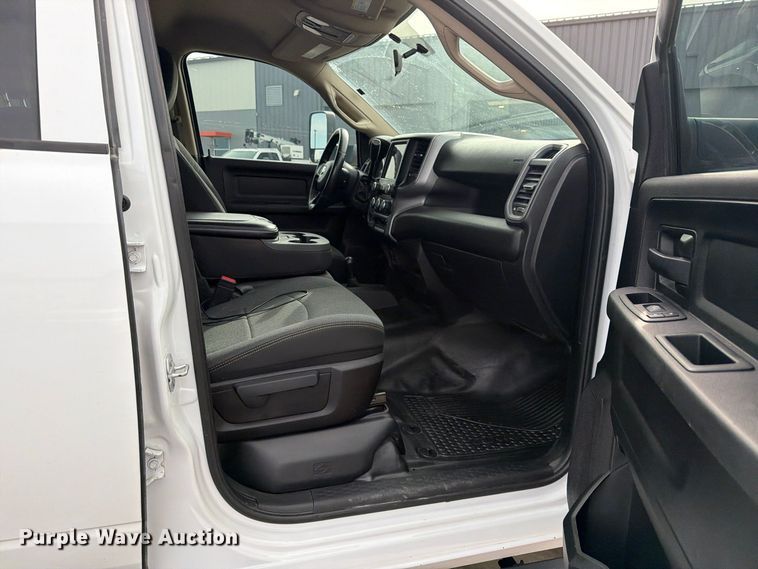 image for item EW1194 2020 RAM 3500 Crew Cab flatbed pickup truck