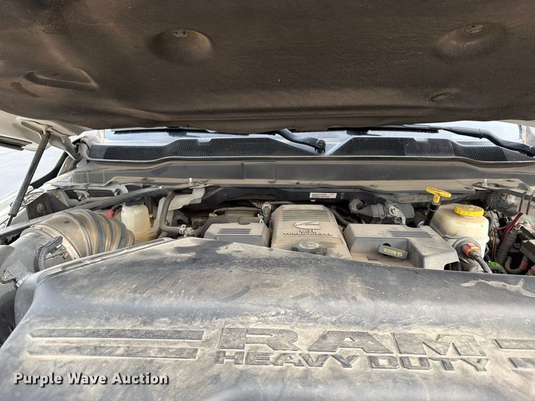 image for item EW1194 2020 RAM 3500 Crew Cab flatbed pickup truck