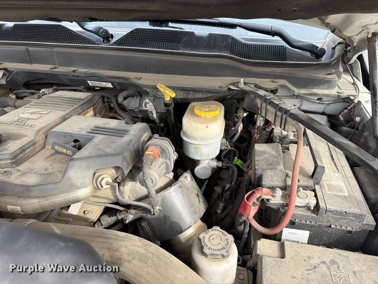 image for item EW1194 2020 RAM 3500 Crew Cab flatbed pickup truck