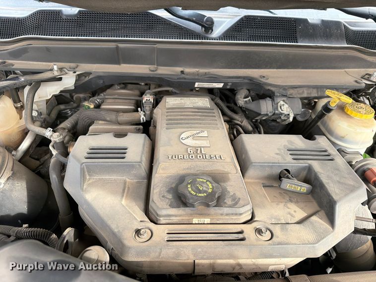 image for item EW1194 2020 RAM 3500 Crew Cab flatbed pickup truck