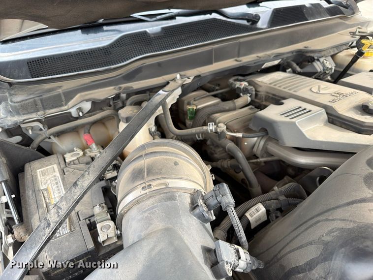 image for item EW1194 2020 RAM 3500 Crew Cab flatbed pickup truck