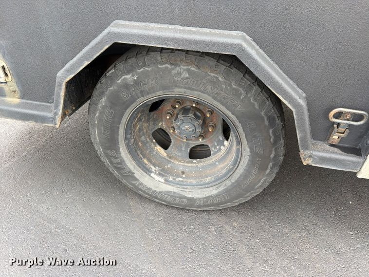 image for item EW1194 2020 RAM 3500 Crew Cab flatbed pickup truck