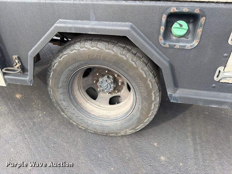 image for item EW1194 2020 RAM 3500 Crew Cab flatbed pickup truck