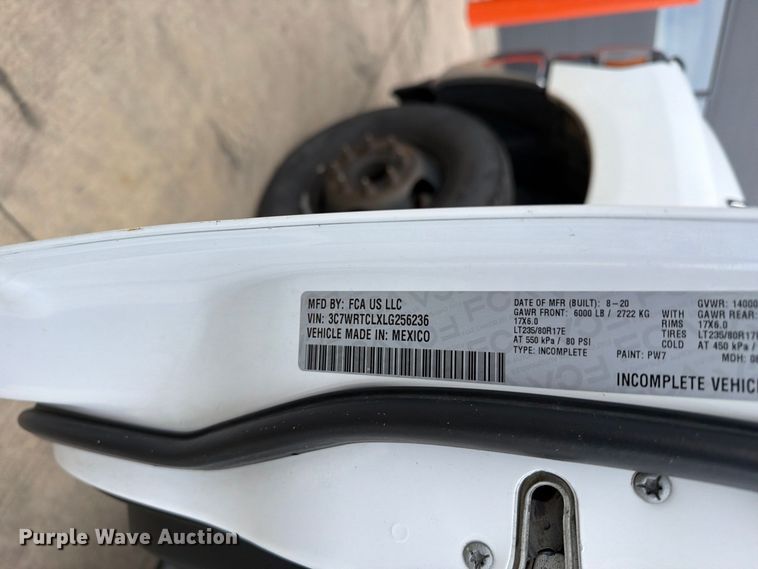 image for item EW1194 2020 RAM 3500 Crew Cab flatbed pickup truck