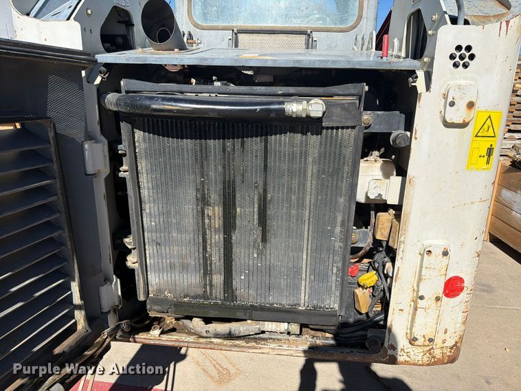 image for item EW1197 2014 Takeuchi TL10 tracked skid steer loader
