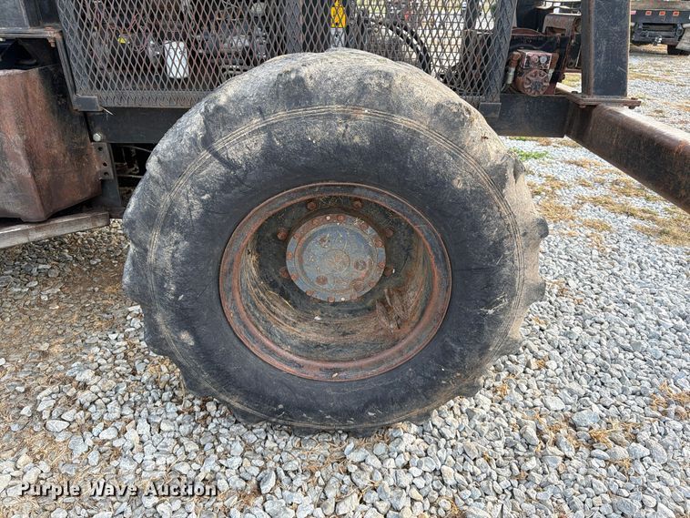image for item FG0847 2000 New Holland TS110 MFWD tractor