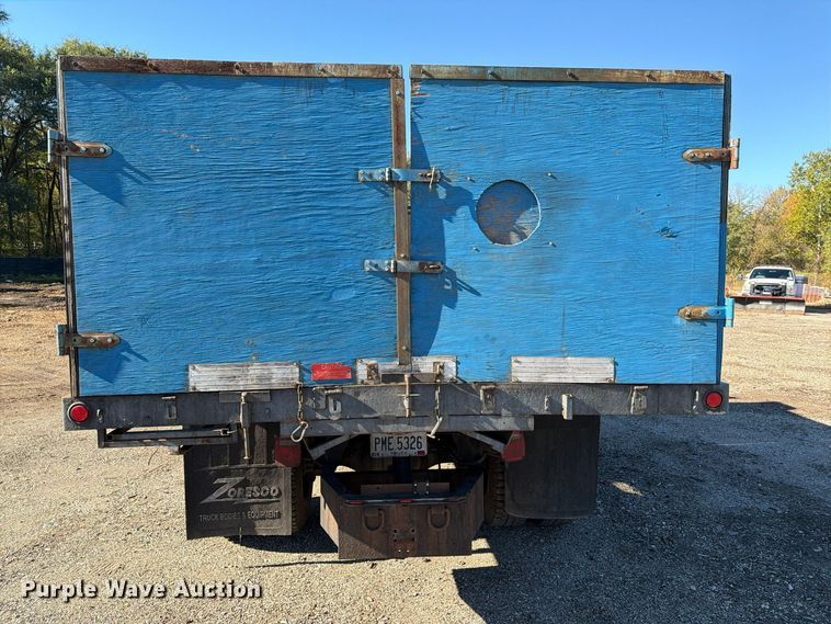 image for item FG3059 1999 International 4700 dump flatbed truck