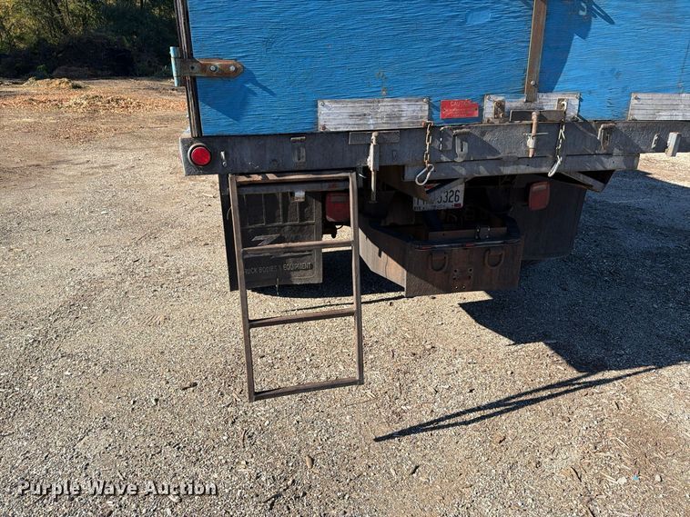 image for item FG3059 1999 International 4700 dump flatbed truck