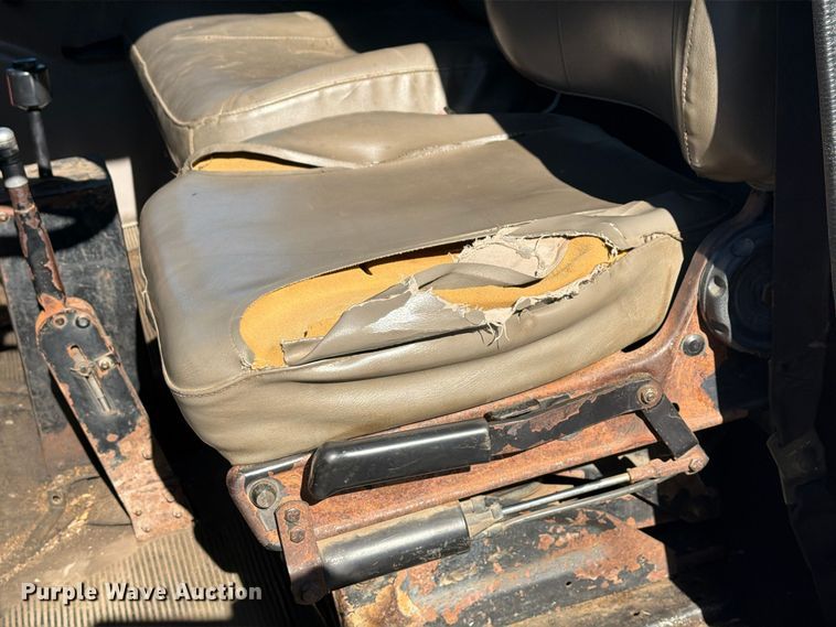 image for item FG3059 1999 International 4700 dump flatbed truck