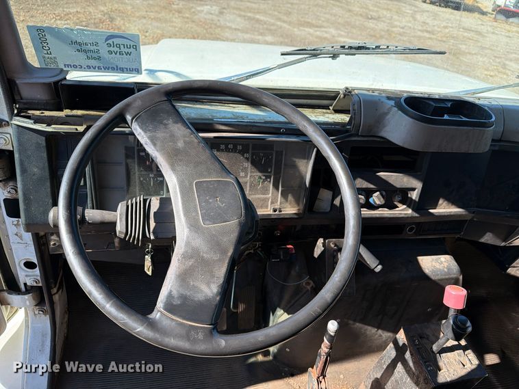 image for item FG3059 1999 International 4700 dump flatbed truck