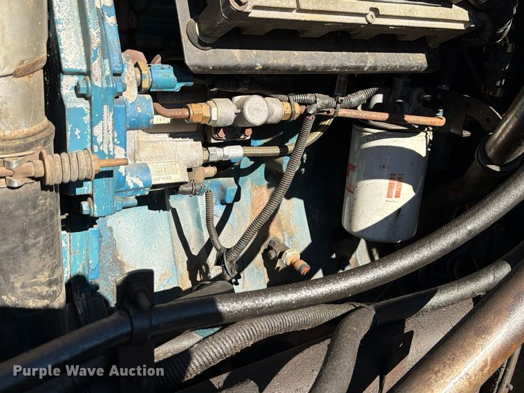 image for item FG3059 1999 International 4700 dump flatbed truck