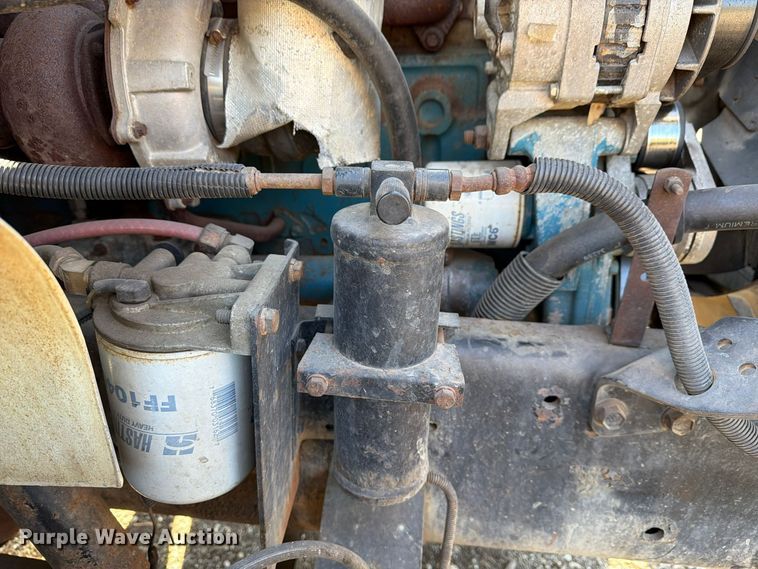 image for item FG3059 1999 International 4700 dump flatbed truck