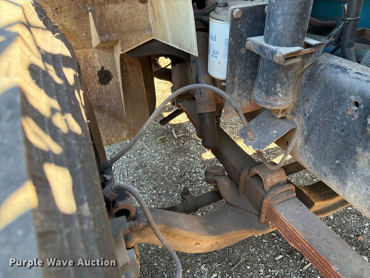 image for item FG3059 1999 International 4700 dump flatbed truck
